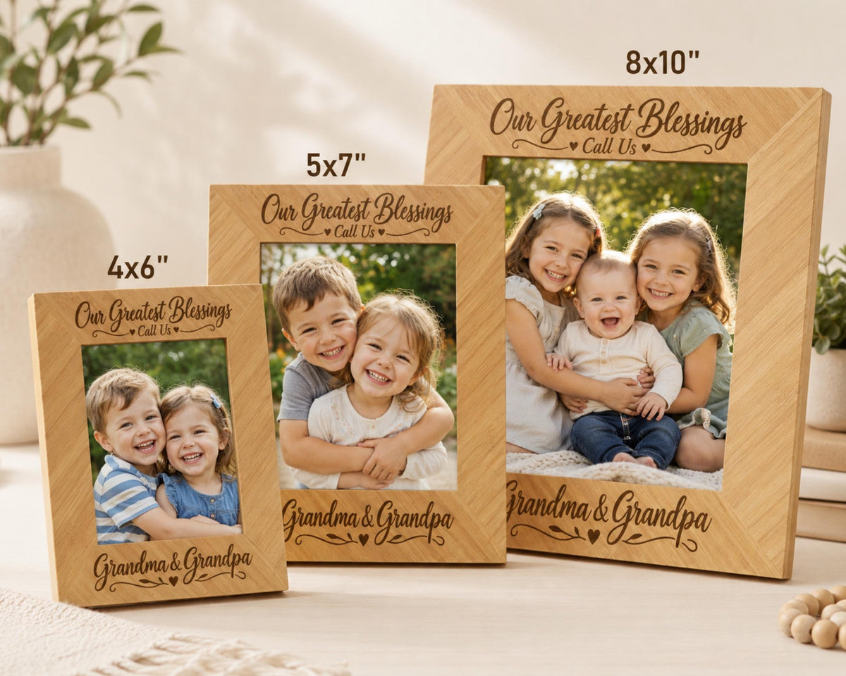 three wooden picture frames, each containing a family portrait of children and their grandparents. The frames are labeled with the sizes of the photos they contain, ranging from 5'7" to 4'6". The frames are placed on a table, with a plant and a vase visible in the background.