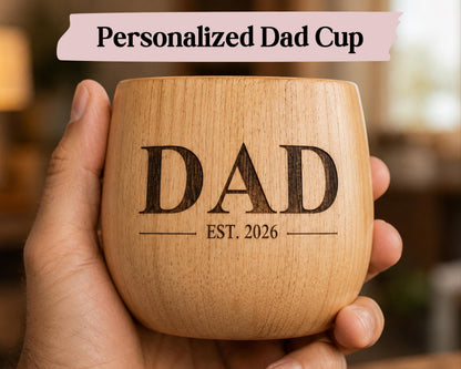 Etched Moment personalized wooden tumbler engraved with DAD EST. 2026. Rustic wood coffee mug.